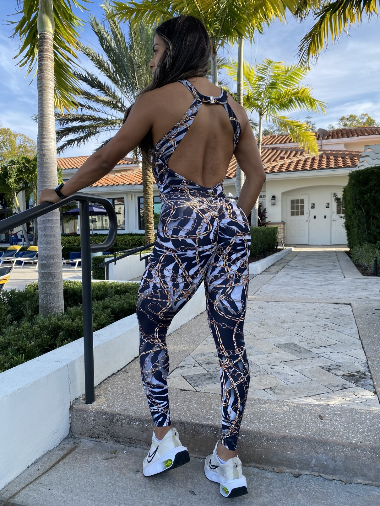 SCRUNCH BOOTY ZEBRA AND GOLD CHAIN JUMPSUIT