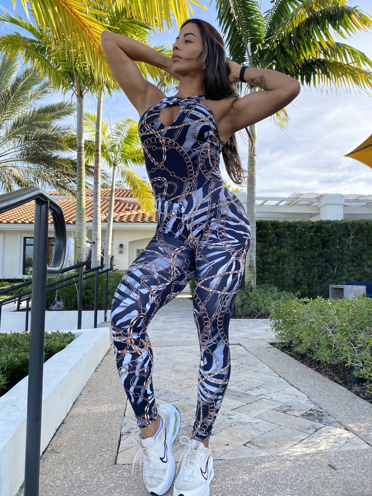 SCRUNCH BOOTY ZEBRA AND GOLD CHAIN JUMPSUIT